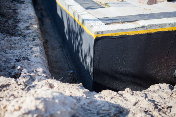 Professional Waterproofing technician working in Mongo, IN